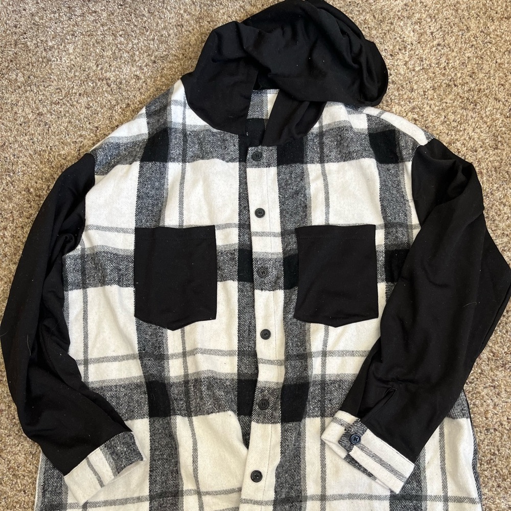 Never worn Lightweight black/white plaid button up size large but fits as an XL